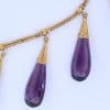 A spectacular antique amethyst parure, made in Italy circa 1880. An impressive suite of matching jewellery, showcasing the rich violet beauty of amethyst and the elaborate craftsmanship characteristic of late 19th-century Italian jewellery. Parures were particularly prized for their coordinated design, with matching pieces intended to be worn together for formal occasions. This exceptional suite is a wonderful example of the Victorian fascination with richly coloured gemstones and grand, coordinated jewels.