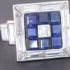 Dating to circa 1935, this Art Deco sapphire and diamond panel ring reflects the elegance and geometric sophistication of the period. Art Deco jewellery is celebrated for its architectural lines, balanced symmetry and striking combinations of precious gemstones, making pieces from this era enduring favourites among collectors of antique jewellery.