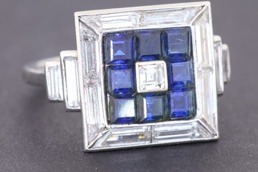 Dating to circa 1935, this Art Deco sapphire and diamond panel ring reflects the elegance and geometric sophistication of the period. Art Deco jewellery is celebrated for its architectural lines, balanced symmetry and striking combinations of precious gemstones, making pieces from this era enduring favourites among collectors of antique jewellery.