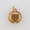 A wonderful antique Portuguese locket, crafted in 19-karat gold. Combining fine gold craftsmanship with an intimate, personal purpose, this distinctive jewel was designed to hold treasured photographs close, preserving memories within an elegant piece of antique jewellery.
