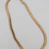 A distinctive gold snake necklace, drawing on one of jewellery’s most enduring and evocative motifs. The serpent has long featured in jewellery design, symbolising renewal, transformation and eternity, making snake jewellery both visually striking and rich in symbolism.