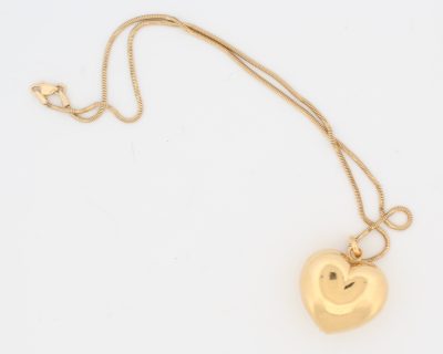 A timeless gold heart pendant, celebrating the enduring symbolism of love and affection. The heart has long been one of jewellery’s most cherished motifs, making this an elegant and meaningful piece to wear or give as a treasured gift.