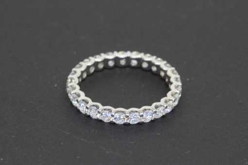 A timeless diamond full eternity ring, celebrating the enduring beauty and brilliance of diamonds. Designed to encircle the finger with a continuous line of sparkle, the full eternity style has long been cherished as a symbol of everlasting love and commitment.