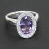 An elegant amethyst and diamond cluster ring, combining the rich violet hues of amethyst with the timeless brilliance of diamonds. This classic gemstone pairing creates a beautiful contrast of colour and sparkle, while the refined setting lends the ring an enduring sophistication.