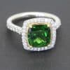 A superb chrome tourmaline and diamond cluster ring, combining the vivid allure of a rare coloured gemstone with the timeless brilliance of diamonds. Set in platinum, this striking jewel brings together rich colour and refined craftsmanship in an elegant cluster design.