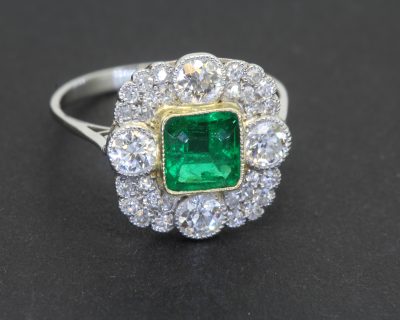 A beautiful Belle Époque emerald and diamond ring, reflecting the elegance and romantic artistry of the period spanning the late nineteenth and early twentieth centuries. Belle Époque jewellery is celebrated for its delicate sophistication, graceful designs and exquisite use of precious gemstones. The combination of a superb Colombian emerald and diamonds captures the enduring appeal of this distinguished jewellery tradition.