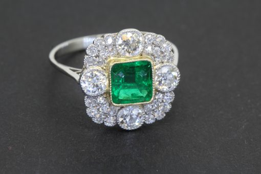 A beautiful Belle Époque emerald and diamond ring, reflecting the elegance and romantic artistry of the period spanning the late nineteenth and early twentieth centuries. Belle Époque jewellery is celebrated for its delicate sophistication, graceful designs and exquisite use of precious gemstones. The combination of a superb Colombian emerald and diamonds captures the enduring appeal of this distinguished jewellery tradition.