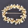 A striking Modernist diamond and gold brooch, made by Wests of Dublin, one of Ireland’s most distinguished jewellery houses. The brooch reflects the clean, sculptural aesthetic of Modernist jewellery, where traditional precious materials were interpreted through bold forms and a more contemporary approach to design.
