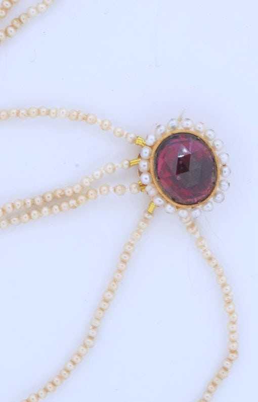 A remarkable antique parure of coral, garnet, cultured pearl, 18kt gold and gilded metal, associated with the Countess du Durat. An extraordinary and highly unusual suite comprising three tiaras, a necklace, a pair of ear pendants, a pair of ear clips and two bracelets. The parure is particularly evocative for its aristocratic association and the extraordinary breadth of the suite. The Comtesses de Durat belonged to a lineage whose history extended through one of the most turbulent periods of French history, navigating the upheavals of the French Revolution before re-establishing their position within aristocratic society during the Napoleonic era. The family also had a Caribbean branch connected with French colonial administration in territories including Grenada and Saint Martin, while members of the family in mainland France maintained important estates and family residences. Among the women associated with the lineage were Jeanne-Caroline de Patouillet de Deservillers and Marie Marguerite Henriette de Durat, figures remembered in regional records for their cultivation and erudition.