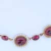 A remarkable antique parure of coral, garnet, cultured pearl, 18kt gold and gilded metal, associated with the Countess du Durat. An extraordinary and highly unusual suite comprising three tiaras, a necklace, a pair of ear pendants, a pair of ear clips and two bracelets. The parure is particularly evocative for its aristocratic association and the extraordinary breadth of the suite. The Comtesses de Durat belonged to a lineage whose history extended through one of the most turbulent periods of French history, navigating the upheavals of the French Revolution before re-establishing their position within aristocratic society during the Napoleonic era. The family also had a Caribbean branch connected with French colonial administration in territories including Grenada and Saint Martin, while members of the family in mainland France maintained important estates and family residences. Among the women associated with the lineage were Jeanne-Caroline de Patouillet de Deservillers and Marie Marguerite Henriette de Durat, figures remembered in regional records for their cultivation and erudition.