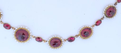 A remarkable antique parure of coral, garnet, cultured pearl, 18kt gold and gilded metal, associated with the Countess du Durat. An extraordinary and highly unusual suite comprising three tiaras, a necklace, a pair of ear pendants, a pair of ear clips and two bracelets. The parure is particularly evocative for its aristocratic association and the extraordinary breadth of the suite. The Comtesses de Durat belonged to a lineage whose history extended through one of the most turbulent periods of French history, navigating the upheavals of the French Revolution before re-establishing their position within aristocratic society during the Napoleonic era. The family also had a Caribbean branch connected with French colonial administration in territories including Grenada and Saint Martin, while members of the family in mainland France maintained important estates and family residences. Among the women associated with the lineage were Jeanne-Caroline de Patouillet de Deservillers and Marie Marguerite Henriette de Durat, figures remembered in regional records for their cultivation and erudition.
