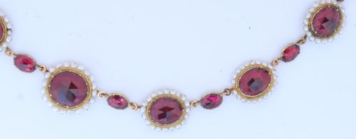 A remarkable antique parure of coral, garnet, cultured pearl, 18kt gold and gilded metal, associated with the Countess du Durat. An extraordinary and highly unusual suite comprising three tiaras, a necklace, a pair of ear pendants, a pair of ear clips and two bracelets. The parure is particularly evocative for its aristocratic association and the extraordinary breadth of the suite. The Comtesses de Durat belonged to a lineage whose history extended through one of the most turbulent periods of French history, navigating the upheavals of the French Revolution before re-establishing their position within aristocratic society during the Napoleonic era. The family also had a Caribbean branch connected with French colonial administration in territories including Grenada and Saint Martin, while members of the family in mainland France maintained important estates and family residences. Among the women associated with the lineage were Jeanne-Caroline de Patouillet de Deservillers and Marie Marguerite Henriette de Durat, figures remembered in regional records for their cultivation and erudition.