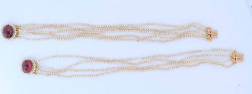 A remarkable antique parure of coral, garnet, cultured pearl, 18kt gold and gilded metal, associated with the Countess du Durat. An extraordinary and highly unusual suite comprising three tiaras, a necklace, a pair of ear pendants, a pair of ear clips and two bracelets. The parure is particularly evocative for its aristocratic association and the extraordinary breadth of the suite. The Comtesses de Durat belonged to a lineage whose history extended through one of the most turbulent periods of French history, navigating the upheavals of the French Revolution before re-establishing their position within aristocratic society during the Napoleonic era. The family also had a Caribbean branch connected with French colonial administration in territories including Grenada and Saint Martin, while members of the family in mainland France maintained important estates and family residences. Among the women associated with the lineage were Jeanne-Caroline de Patouillet de Deservillers and Marie Marguerite Henriette de Durat, figures remembered in regional records for their cultivation and erudition.