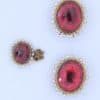 A remarkable antique parure of coral, garnet, cultured pearl, 18kt gold and gilded metal, associated with the Countess du Durat. An extraordinary and highly unusual suite comprising three tiaras, a necklace, a pair of ear pendants, a pair of ear clips and two bracelets. The parure is particularly evocative for its aristocratic association and the extraordinary breadth of the suite. The Comtesses de Durat belonged to a lineage whose history extended through one of the most turbulent periods of French history, navigating the upheavals of the French Revolution before re-establishing their position within aristocratic society during the Napoleonic era. The family also had a Caribbean branch connected with French colonial administration in territories including Grenada and Saint Martin, while members of the family in mainland France maintained important estates and family residences. Among the women associated with the lineage were Jeanne-Caroline de Patouillet de Deservillers and Marie Marguerite Henriette de Durat, figures remembered in regional records for their cultivation and erudition.