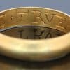 An extremely rare Tudor gold posy ring, engraved to the interior with the wonderfully intimate inscription “BE TRVE IN HART”, meaning “Be true in heart.” The ring was found by a metal detectorist in Shropshire in October 2024, adding a remarkable modern chapter to its long history. Posy rings were deeply personal jewels, traditionally engraved with short expressions of love, loyalty or devotion, and this inscription is particularly evocative in its simplicity. Examples bearing this distinctive Gothic-style lettering tend to date to around 1600, placing this ring at a fascinating point between the Tudor and early Stuart periods. Comparable examples can be found in the collections of both the British Museum and the Victoria and Albert Museum.