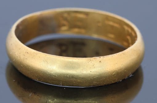 An extremely rare Tudor gold posy ring, engraved to the interior with the wonderfully intimate inscription “BE TRVE IN HART”, meaning “Be true in heart.” The ring was found by a metal detectorist in Shropshire in October 2024, adding a remarkable modern chapter to its long history. Posy rings were deeply personal jewels, traditionally engraved with short expressions of love, loyalty or devotion, and this inscription is particularly evocative in its simplicity. Examples bearing this distinctive Gothic-style lettering tend to date to around 1600, placing this ring at a fascinating point between the Tudor and early Stuart periods. Comparable examples can be found in the collections of both the British Museum and the Victoria and Albert Museum.