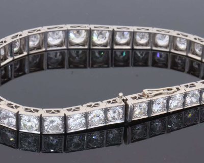 A magnificent antique Edwardian diamond line bracelet, dating to circa 1910 and exemplifying the refined elegance of early 20th-century diamond jewellery. The bracelet is set with an impressive ten carats of Old European-cut diamonds, creating an exceptionally rich and continuous line of diamond. The use of Old European-cut stones gives the bracelet a wonderfully romantic character, with the broad, lively facets producing the distinctive scintillation associated with diamonds of the period.