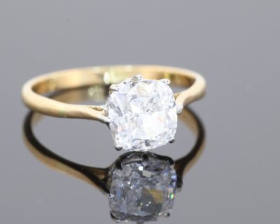 Rare and exceptional, this diamond engagement ring combines impressive diamond quality with the distinctive elegance of the radiant cut. At its centre is a magnificent 1.8-carat diamond, graded D colour and VS clarity by the Gemological Institute of America (GIA). The highest colour grade on the diamond colour scale, D represents exceptional colourlessness, making this a particularly desirable choice for the discerning diamond connoisseur.
