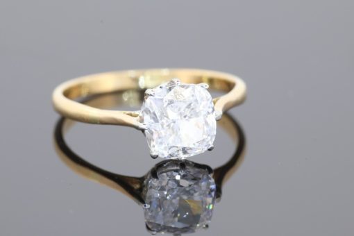 Rare and exceptional, this diamond engagement ring combines impressive diamond quality with the distinctive elegance of the radiant cut. At its centre is a magnificent 1.8-carat diamond, graded D colour and VS clarity by the Gemological Institute of America (GIA). The highest colour grade on the diamond colour scale, D represents exceptional colourlessness, making this a particularly desirable choice for the discerning diamond connoisseur.