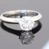 Superb and timeless, this diamond solitaire ring showcases the enduring beauty of an exceptional diamond in a classic platinum setting. At its centre is a magnificent 1.2-carat diamond, graded G colour and VVS1 clarity, offering an outstanding combination of near-colourless beauty and exceptional clarity. Accompanied by a GIA certificate, the diamond has also achieved Triple Excellent grading for cut, polish and symmetry.