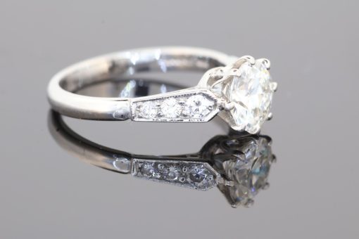 Beautiful and timeless, this diamond engagement ring combines classic elegance with the enduring allure of platinum and diamonds. At its centre is a 1.16-carat diamond, graded H colour and SI2 clarity, accompanied by an AnchorCert certificate for independent gemmological assessment.