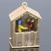 An extremely rare and wonderfully whimsical large gold charm depicting a Punch & Judy show, capturing the theatrical character and humour of one of Britain’s most enduring forms of popular entertainment. Punch & Judy performances have long been associated with seaside resorts, fairs and street entertainment, making this an especially charming subject for a piece of jewellery. The remarkable mechanical element makes the charm particularly unusual and collectible.