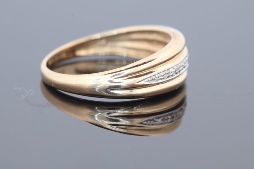 An elegant gold dress ring with timeless appeal, offering a versatile addition to a fine jewellery collection. Its classic character makes it a lovely choice for those who appreciate the warmth and enduring beauty of gold jewellery.