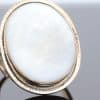 An exceptional Victorian locket ring dating to circa 1870, a fascinating example of the ingenuity and sentimentality that characterised nineteenth-century jewellery. During the Victorian era, personal jewellery often carried intimate meaning, with hidden compartments and keepsake designs allowing treasured photographs and mementoes to be kept close. This remarkable ring combines that romantic tradition with an unusual and ingenious mechanism.
